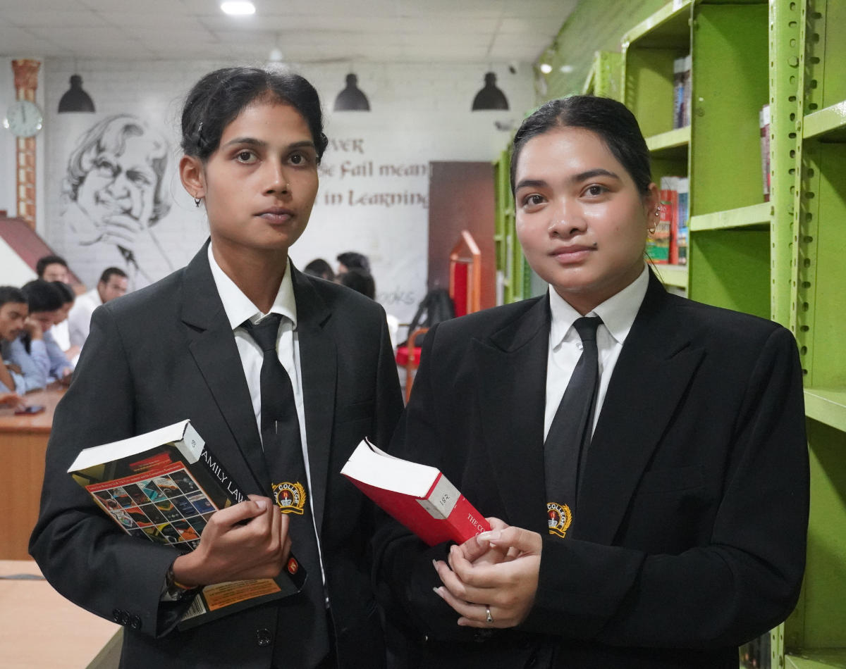 Law student reading in DD College library